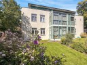 Familienwohnung mit Balkon, groem Garten- und Terrassenanteil und Tiefgaragenstellplatz - Leipzig